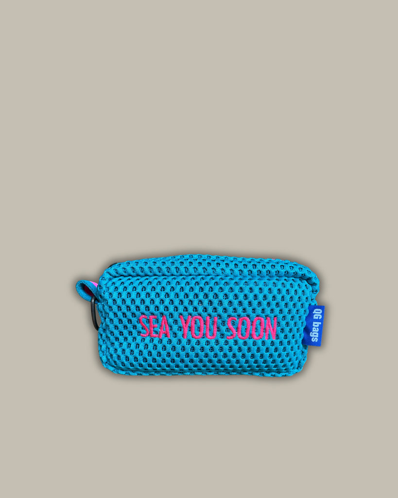 PILLOLA neoprene turchese + ricamo fucsia