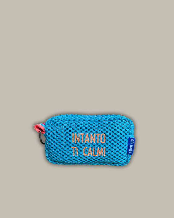 PILLOLA neoprene turchese + ricamo arancione