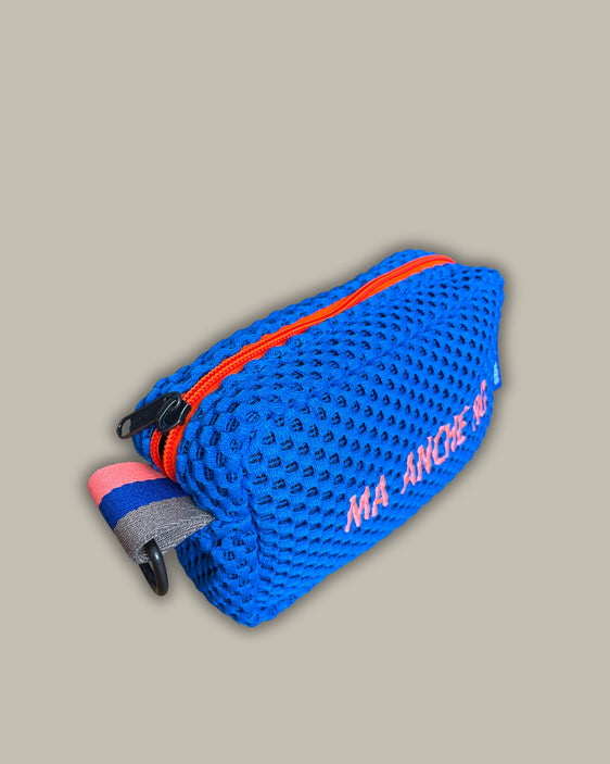 Light blue pill with fluorescent pink embroidery