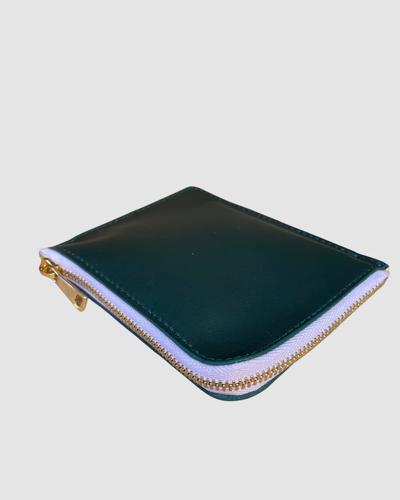 IL BAU pelle verde scuro + zip rosa