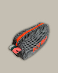 Light blue pill with fluorescent pink embroidery