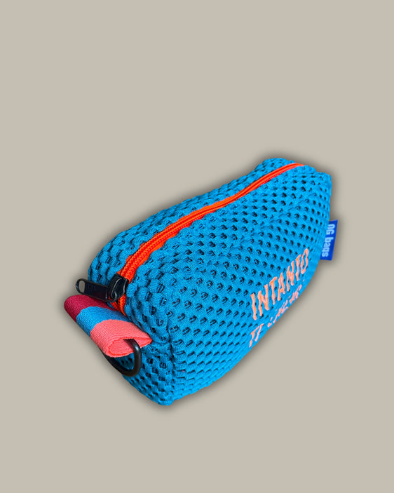 PILLOLA neoprene turchese + ricamo arancione