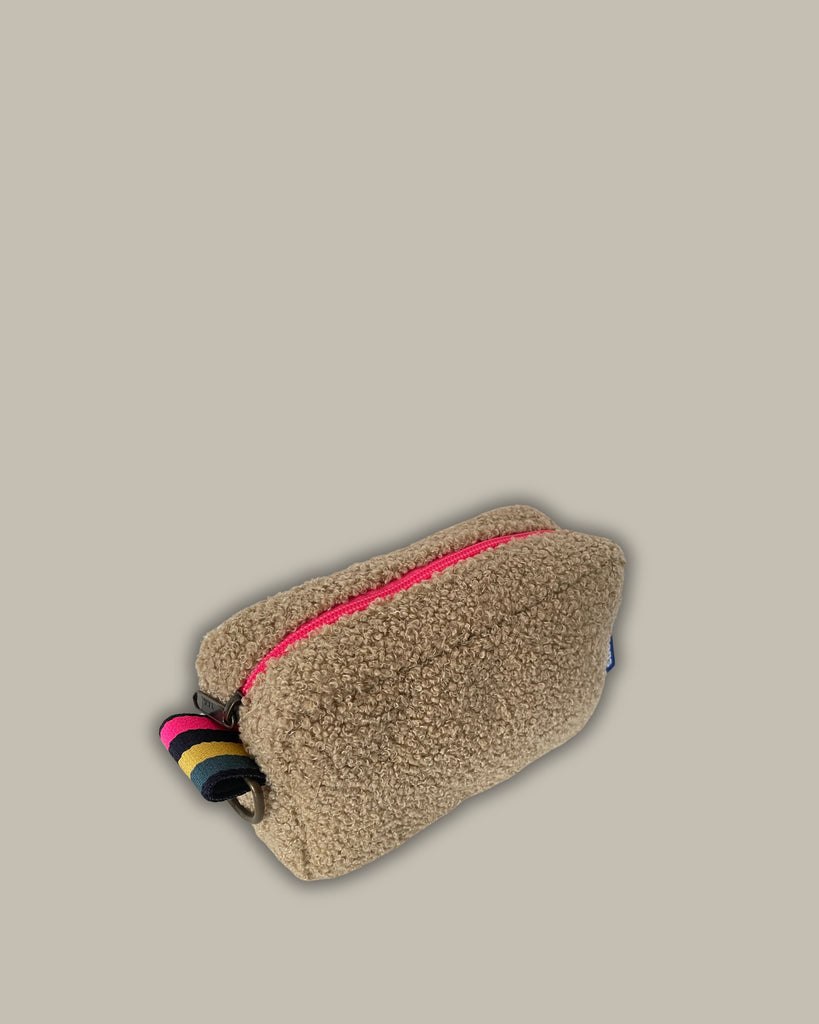 PILLOLA tessuto pelosino beige + cerniera fucsia fluo