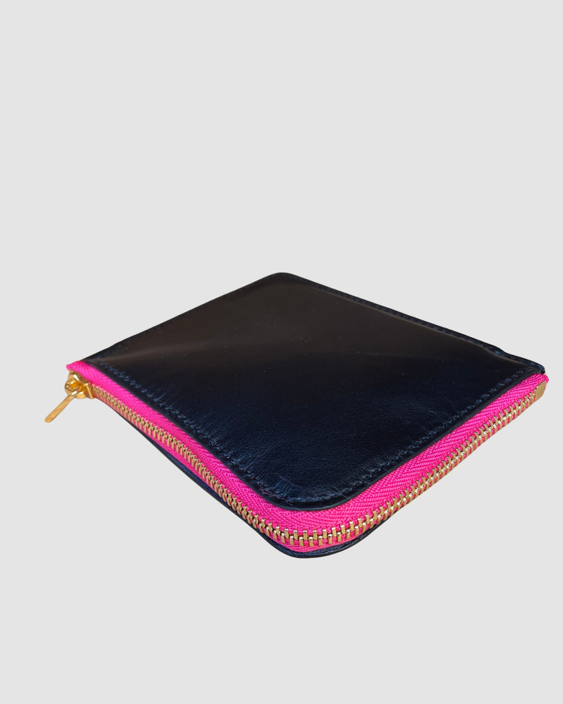IL BAU pelle nera + zip fucsia fluo