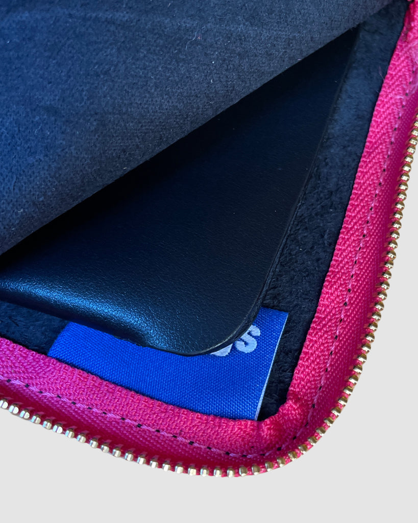 IL BAU pelle nera + zip fucsia fluo