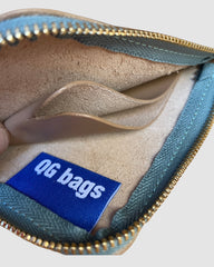 IL BAU pelle beige + zip verde acqua