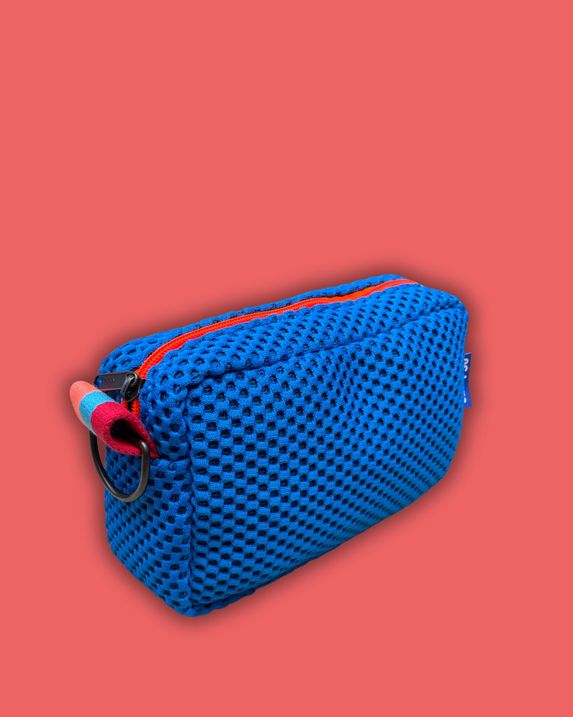 KATE neoprene azzurro + cerniera arancione fluo