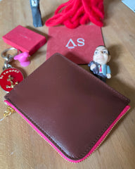 THE DOG blue leather + red zip