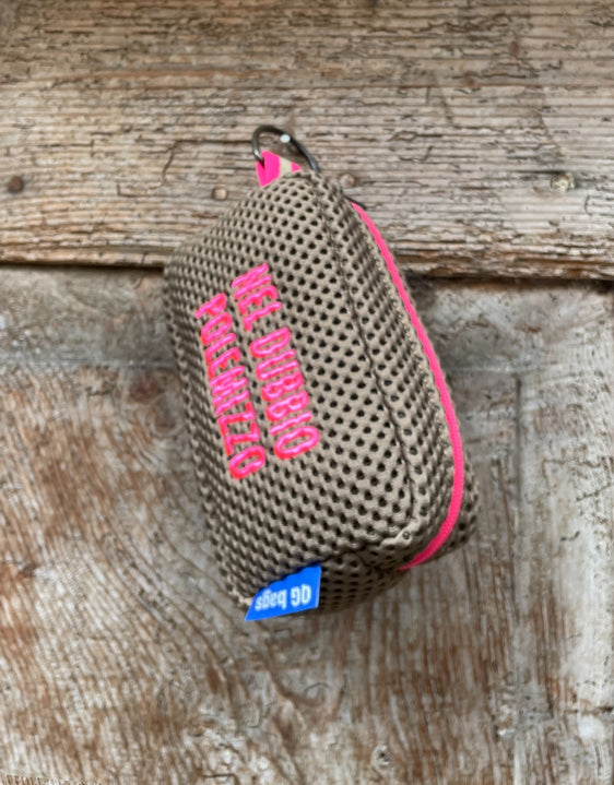 Light blue pill with fluorescent pink embroidery