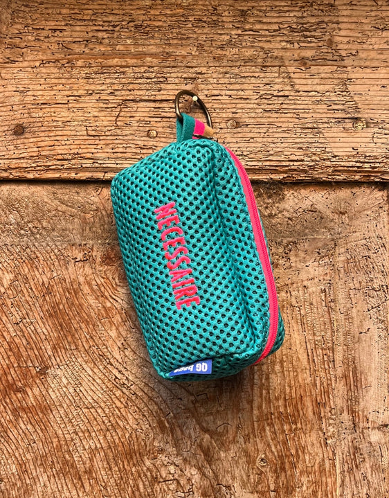 PILLOLA neoprene turchese + ricamo fucsia fluo