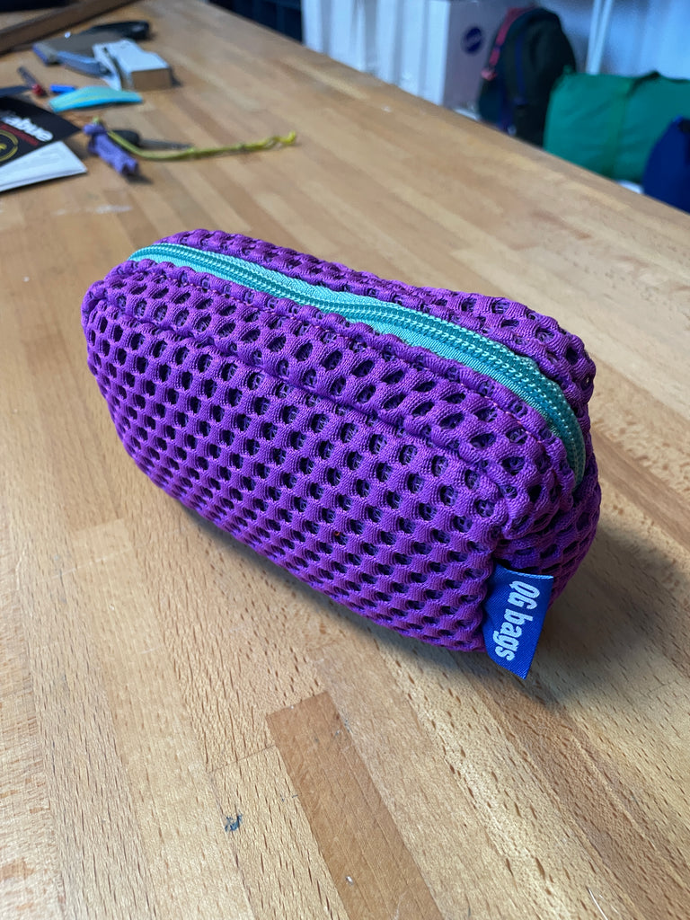 MICRO PILLOLA neoprene ciclamino + cerniera verde acqua