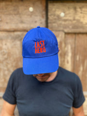 electric blue fabric + fluorescent orange embroidery