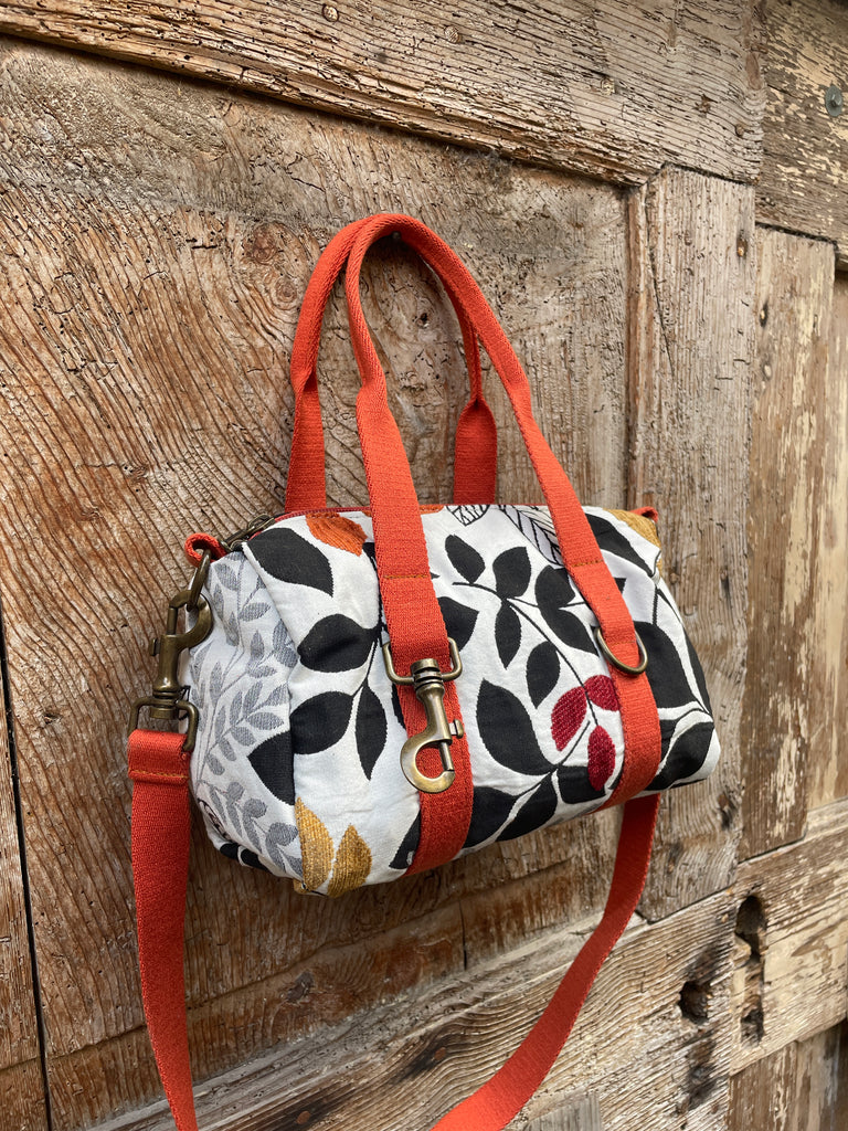 MINI BAULETTO tessuto tramato fiorato - manico arancione scuro