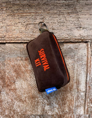 PILLOLA velluto marrone + ricamo arancione fluo