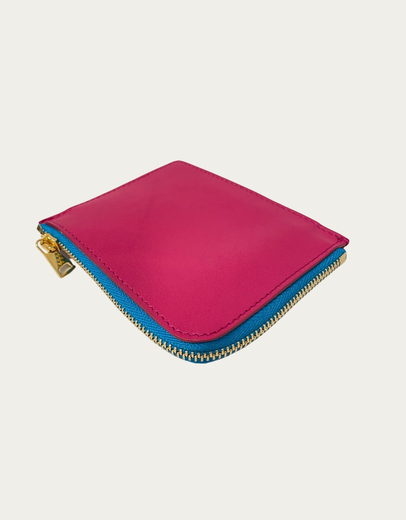 THE DOG blue leather + red zip