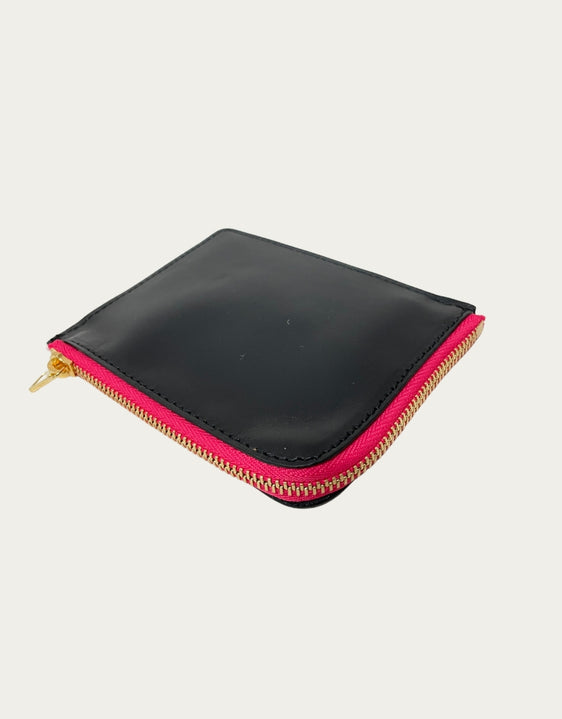 IL BAU pelle nera + zip fucsia fluo