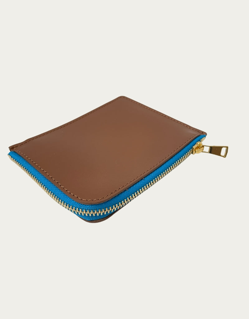 THE DOG blue leather + red zip