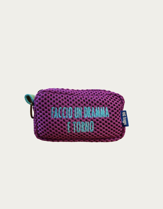 Light blue pill with fluorescent pink embroidery